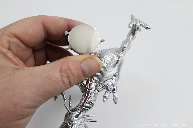 If you like girly car accessories you're gonna love these removable DIY hood ornaments made from small toys & other light weight objects. Make a whole set!