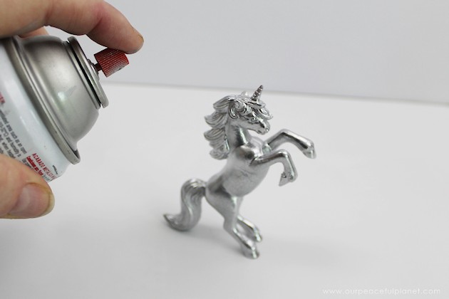 If you like girly car accessories you're gonna love these removable DIY hood ornaments made from small toys & other light weight objects. Make a whole set!