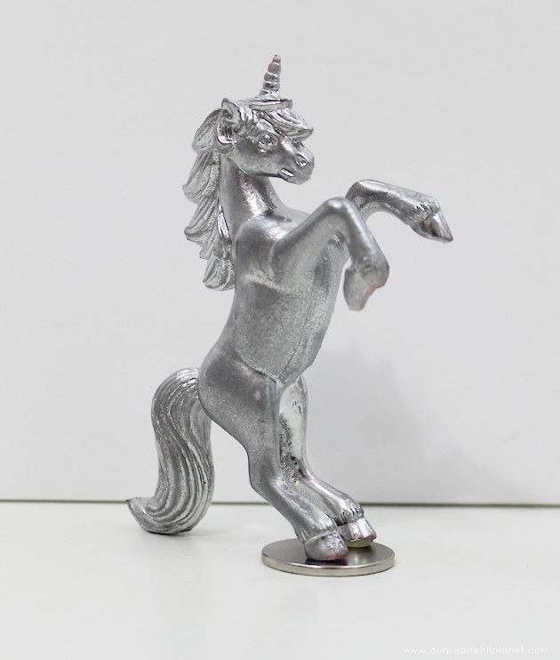 If you like girly car accessories you're gonna love these removable DIY hood ornaments made from small toys & other light weight objects. Make a whole set!