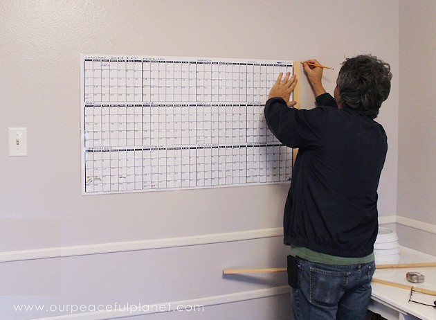 A whiteboard calendar can be a wonderful asset for a business or family scheduling. Learn how to make your own with time zone clocks above it!