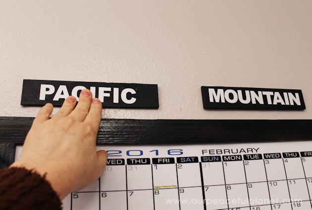 A whiteboard calendar can be a wonderful asset for a business or family scheduling. Learn how to make your own with time zone clocks above it!
