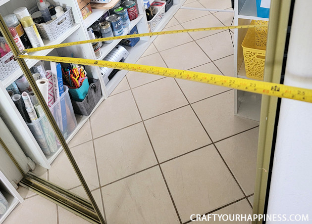 Check out this inexpensive simple way to cover closet door mirrors! It's possible you won't have to buy anything but if you do it's cheap!