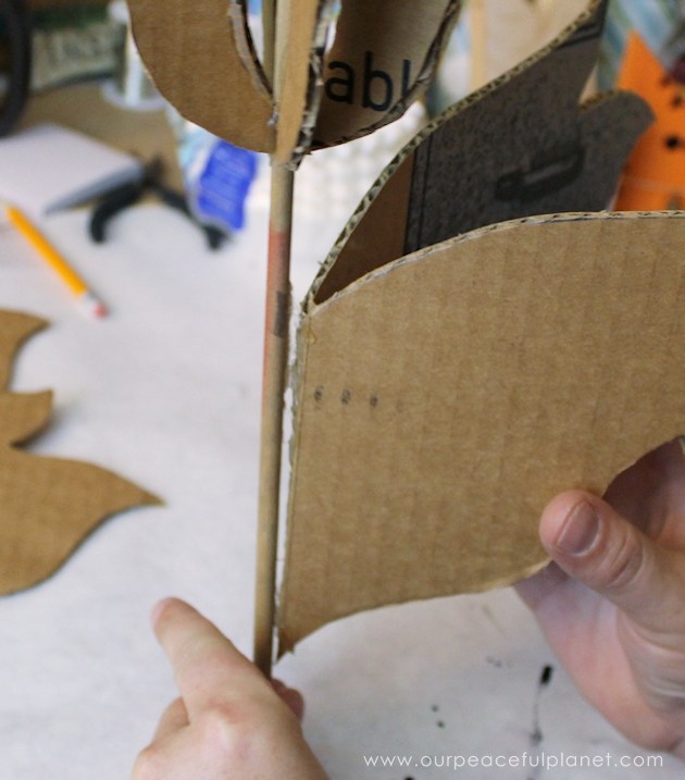 Add a little whimsy to any room with a cardboard chandelier! Grab our free pattern, some cardboard , a hot glue gun and paint. Add any bling you like! 