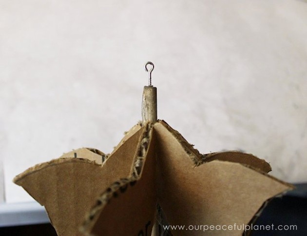 Add a little whimsy to any room with a cardboard chandelier! Grab our free pattern, some cardboard , a hot glue gun and paint. Add any bling you like! 
