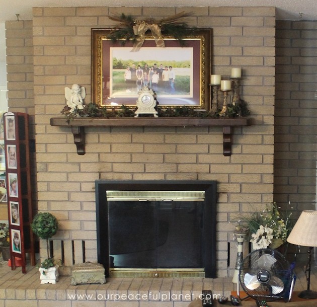 Add some whimsy to your home with this easy DIY picket fence fireplace cover. Made with wood slats and some hinges you can decorate it for any season. 