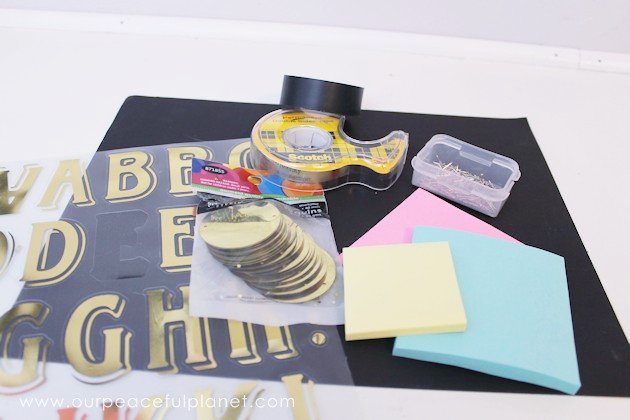 Get organized with this fun huge wall calendar made with Washi tape, large sequins and Post-it notes! It's great for a home offices or a family center!