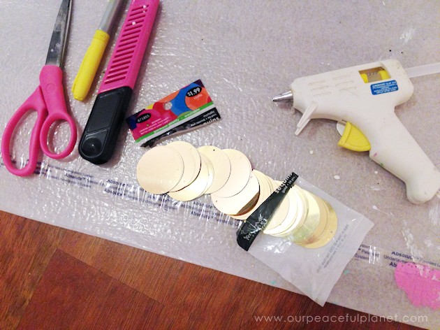 With a foam sheet, 40mm round gold sequins and hot glue you can make this awesome huge lightning bolt cheap wall decor statement piece. Shockingly gorgeous!