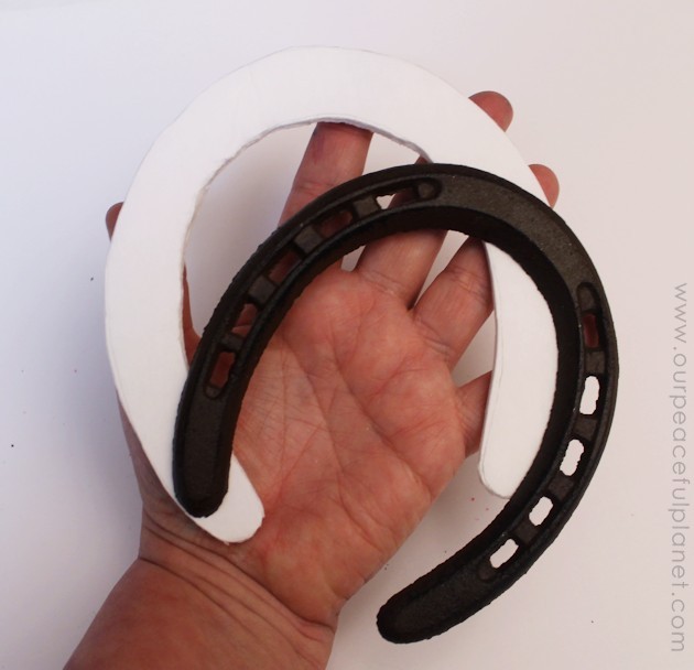 Invite good luck into your home by hanging a beautiful lucky horseshoe. Use a typical horseshoe or make one out of foam board with our pattern. It's easy!