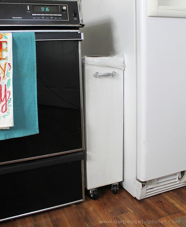 Can't find a large enough kitchen trash can to fit a space? You can make one on wheels to fit any spot! All you need are a few simple supplies and tools