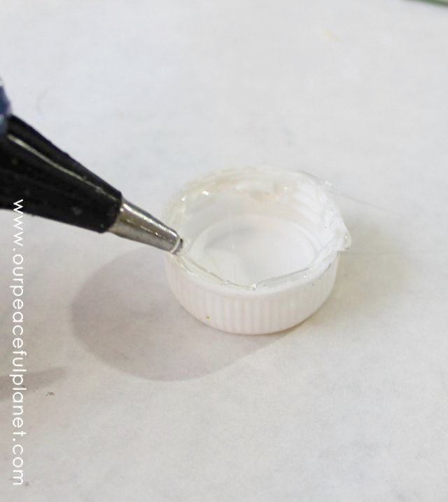 Spin tops might be old fashioned but these custom tops made from a CD a ping pong ball and a soda lid are a blast played in a group, and they spin forever!
