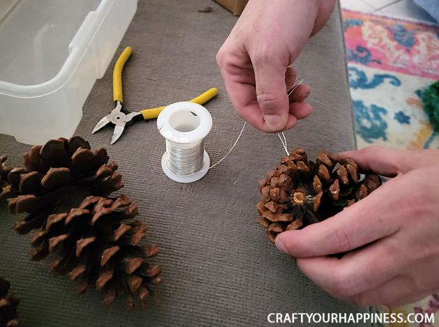 Brighten up your holiday and deck your halls by making your own fancy DIY garland from plain green garland. 