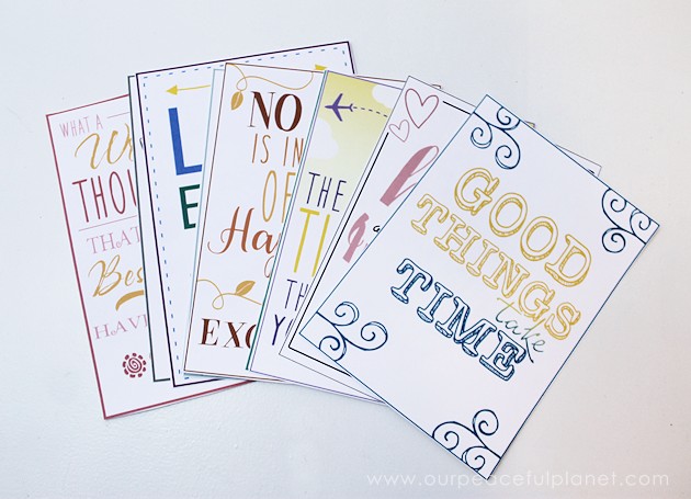 This classy display clip stand is made from a candle holder, dowel and bobby pin and it can not only display he free printable motivational quotes below but photos and more!