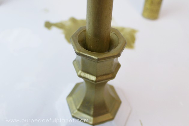 This classy display clip stand is made from a candle holder, dowel and bobby pin and it can not only display he free printable motivational quotes below but photos and more!
