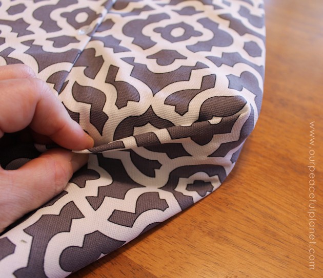 Upholstery pins are are an incredibly simple yet versatile tool for doing some quick no-sew recovering in your home. We recovered a window seat in minutes!