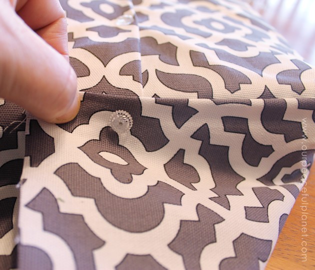 Upholstery pins are are an incredibly simple yet versatile tool for doing some quick no-sew recovering in your home. We recovered a window seat in minutes!