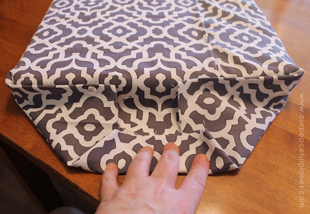 Upholstery pins are are an incredibly simple yet versatile tool for doing some quick no-sew recovering in your home. We recovered a window seat in minutes!
