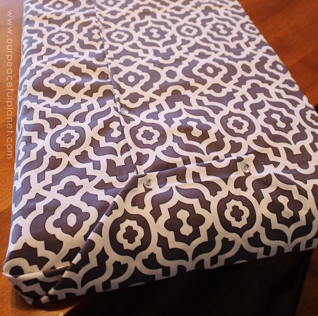 Upholstery pins are are an incredibly simple yet versatile tool for doing some quick no-sew recovering in your home. We recovered a window seat in minutes!