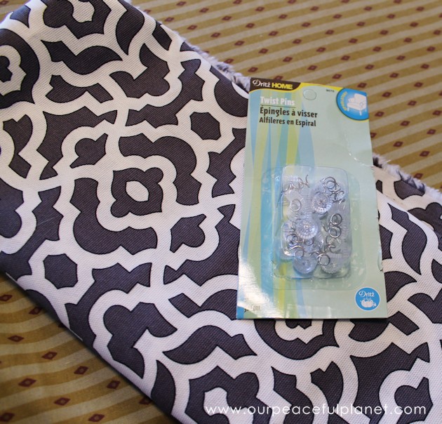 Upholstery pins are are an incredibly simple yet versatile tool for doing some quick no-sew recovering in your home. We recovered a window seat in minutes!