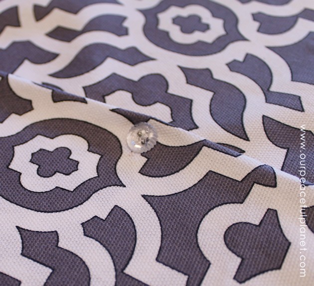 Upholstery pins are are an incredibly simple yet versatile tool for doing some quick no-sew recovering in your home. We recovered a window seat in minutes!