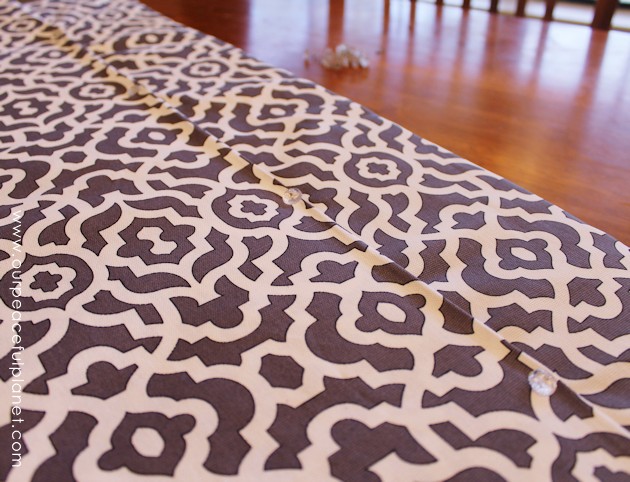 Upholstery pins are are an incredibly simple yet versatile tool for doing some quick no-sew recovering in your home. We recovered a window seat in minutes!