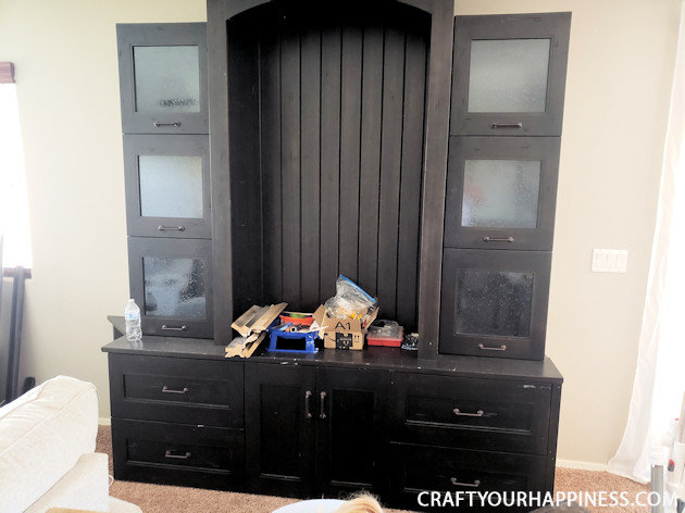  See our hutch makeover! We took an old huge black hutch and turned it into a modern beautiful hutch using paint, new hardware and a little ingenuity!
