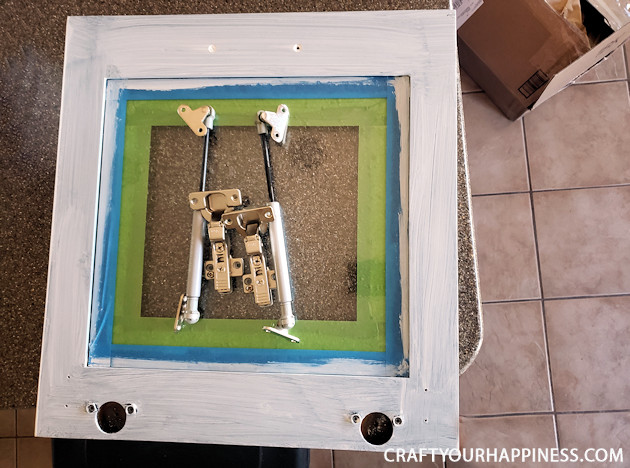  See our hutch makeover! We took an old huge black hutch and turned it into a modern beautiful hutch using paint, new hardware and a little ingenuity!