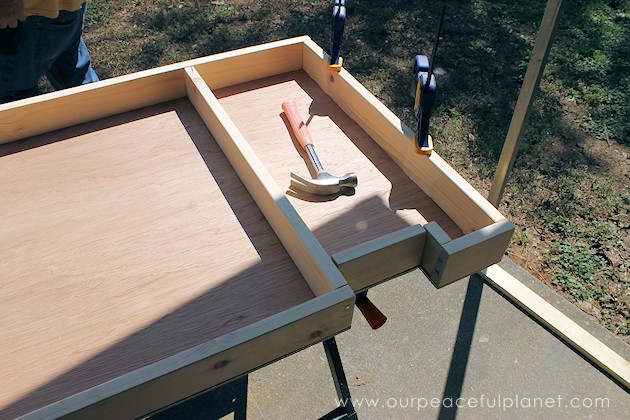 Build your own affordable pantry door organizer with some wood and a few basic tools. It's easier than you think and you'll love the extra storage!