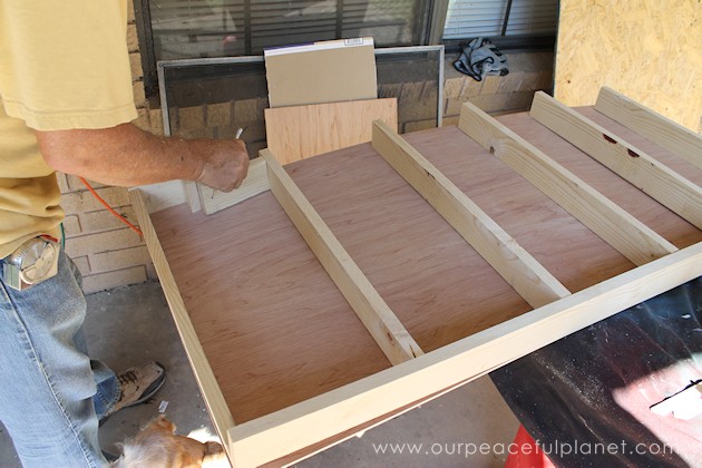 Build your own affordable pantry door organizer with some wood and a few basic tools. It's easier than you think and you'll love the extra storage!