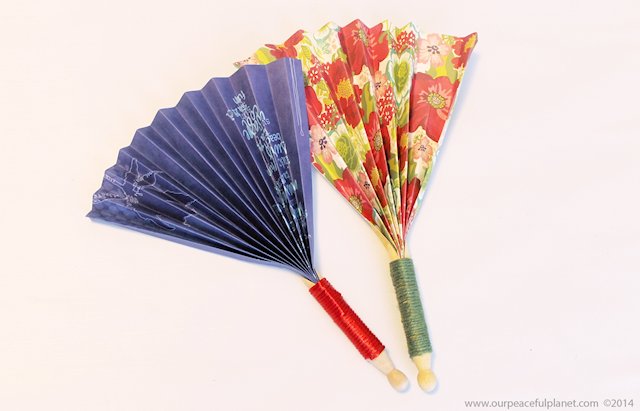 Make these quick hand fans in minutes using a regular wood clothespin and some heavy scrapbook paper. Wrap a little ribbon or twine around them and you have a beautiful way to cool off!