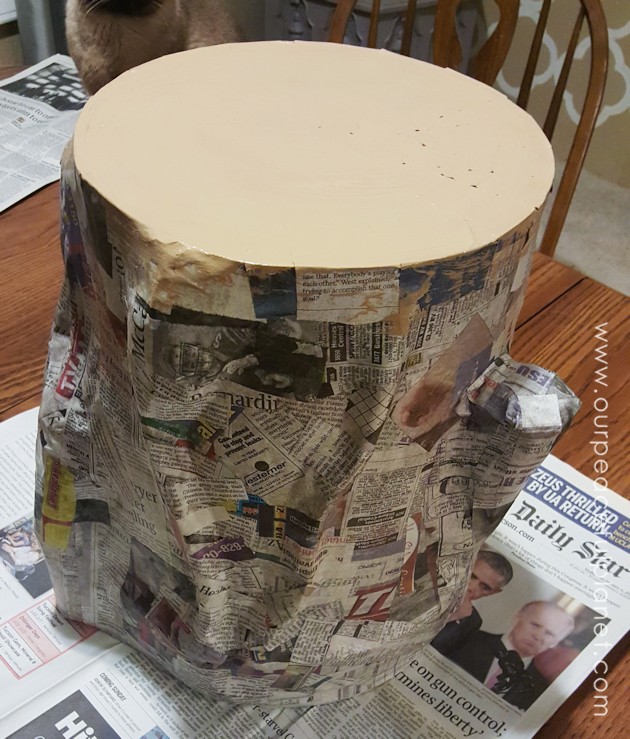 Add some whimsy to your home with this DIY tree stump stool. Remember using paper mache in grammar school? That's what creates the stump effect and it's easier than you think!