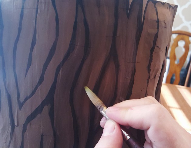 Add some whimsy to your home with this DIY tree stump stool. Remember using paper mache in grammar school? That's what creates the stump effect and it's easier than you think!
