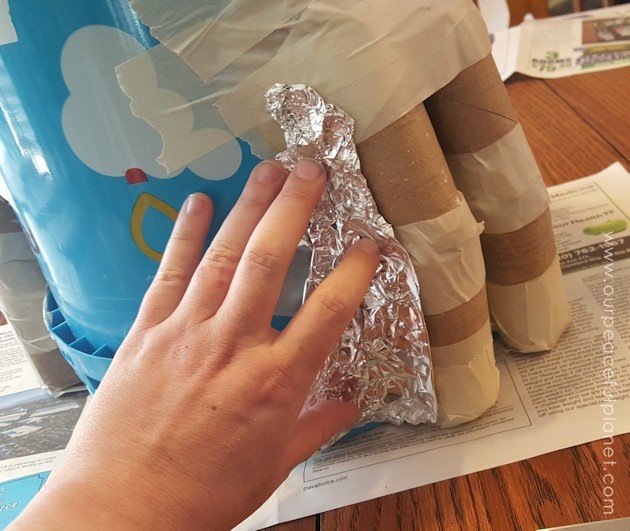 Add some whimsy to your home with this DIY tree stump stool. Remember using paper mache in grammar school? That's what creates the stump effect and it's easier than you think!