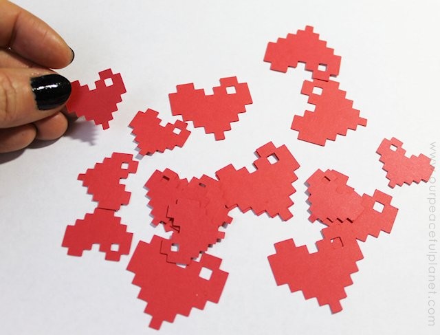 This pixel heart necklace is incredibly easy to make. All you need is some cardstock, glue and our free pattern. You'll be wearing retro jewelry in no time!