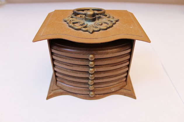 These retro coaster sets found in many thrift stores make a beautiful photo upcycling project with some paint glue and personal pictures!