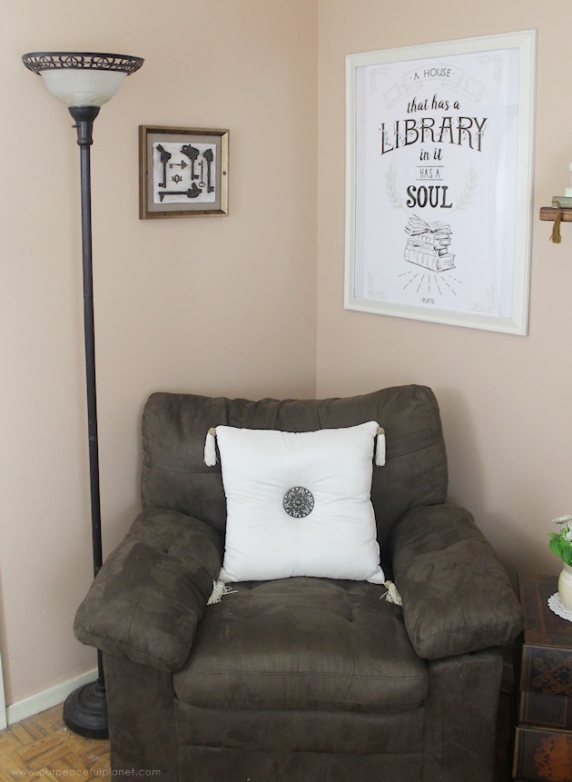 We made a simple room divider and turned a laundry room into a laundry slash home library that has a global feel and you won't believe how easy it was!