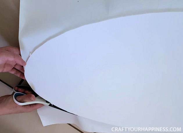 All you need is 3 things to make this lovely simple DIY wood door oval window cover for privacy and it's not only inexpensive it's removable!