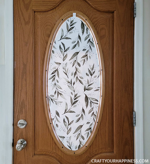 All you need is 3 things to make this lovely simple DIY wood door oval window cover for privacy and it's not only inexpensive it's removable!