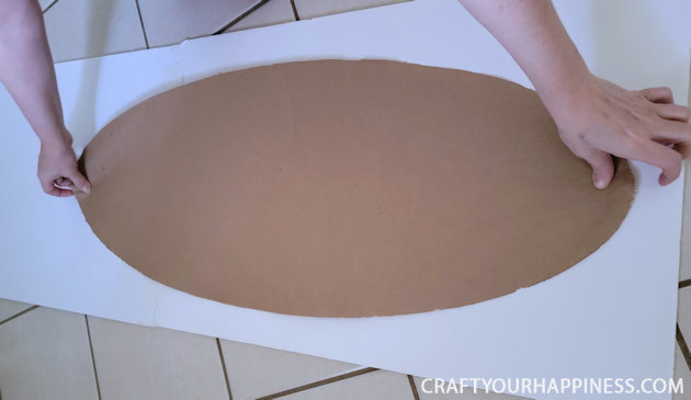 All you need is 3 things to make this lovely simple DIY wood door oval window cover for privacy and it's not only inexpensive it's removable!