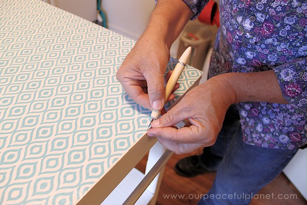 A small kitchen island can be made from things you already have or even rough lumber. Some paint and contact paper and you've got the extra space you need!