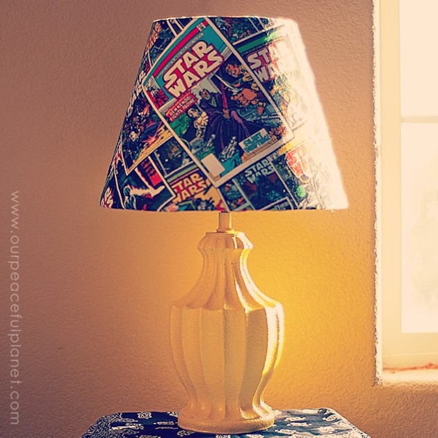 This trendy Star Wars lamp is easy to make and costs very little. All you need is an old lamp, spray paint, Mod Podge and some Star Wars material. 