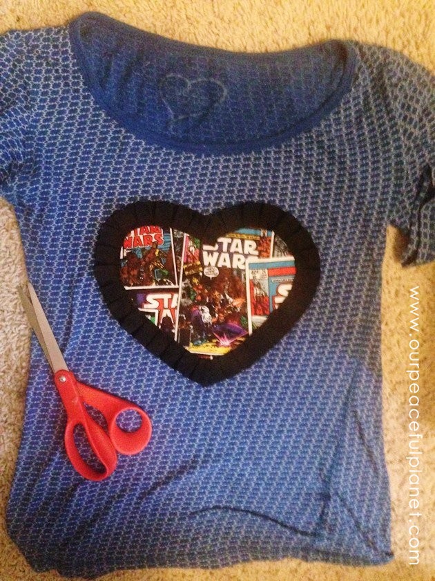 Create and wear a Star Wars T-shirt with pride! Grab a shirt, a scrap of Star Wars material and some fabric edging. You can use fabric glue or sew it on.