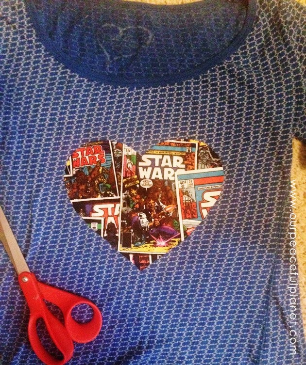 Create and wear a Star Wars T-shirt with pride! Grab a shirt, a scrap of Star Wars material and some fabric edging. You can use fabric glue or sew it on.