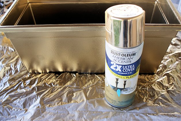 This DIY table centerpiece allows you to change decor year round for any occasion. Then lift out the pegboard insert to find candles for ambient lighting!