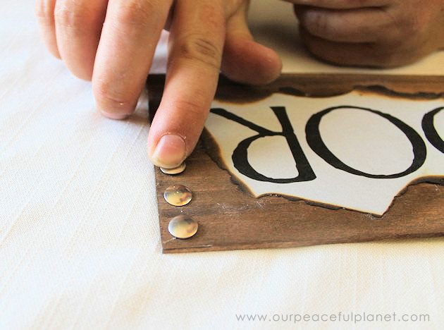 This simple medieval "Hold the Door" sign is part of our Over the Door Decor series. Easy plaques you create to send you out the door with a smile. 