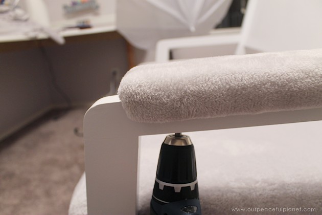Watch how two $2 thrift store office chairs were transformed into a gorgeous comfy bench seat with nothing more than some paint and $6.00 of material.