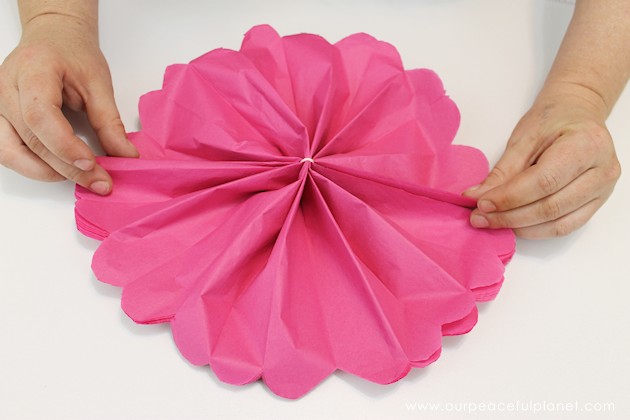 For simple & unique window treatment ideas you'll love our tissue paper flower window toppers. The gorgeous flowers cost pennies & take minutes to make.