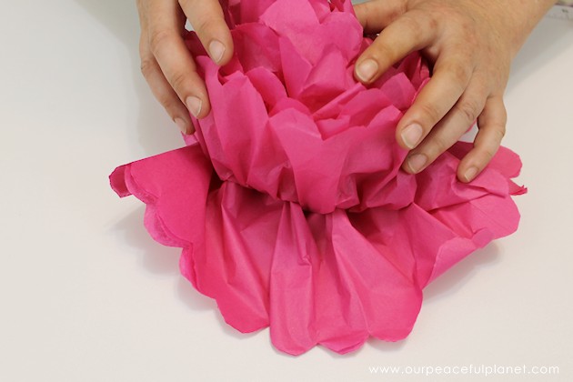 For simple & unique window treatment ideas you'll love our tissue paper flower window toppers. The gorgeous flowers cost pennies & take minutes to make.