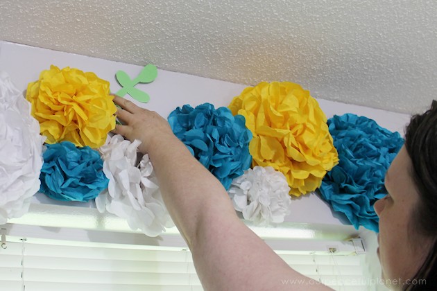 For simple & unique window treatment ideas you'll love our tissue paper flower window toppers. The gorgeous flowers cost pennies & take minutes to make.