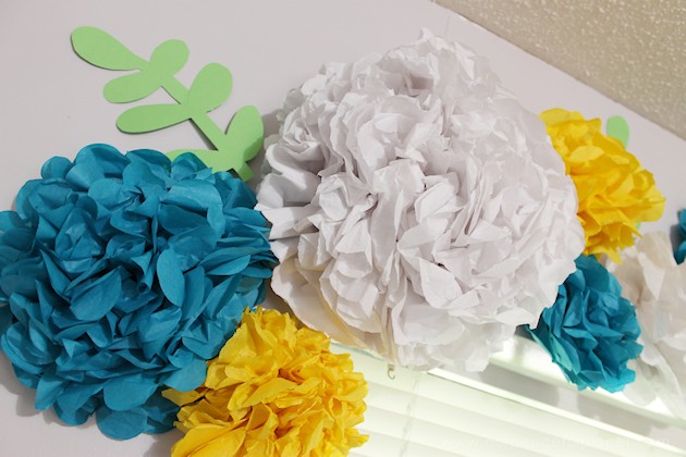 For simple & unique window treatment ideas you'll love our tissue paper flower window toppers. The gorgeous flowers cost pennies & take minutes to make.