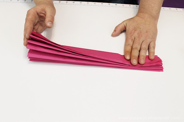 For simple & unique window treatment ideas you'll love our tissue paper flower window toppers. The gorgeous flowers cost pennies & take minutes to make.